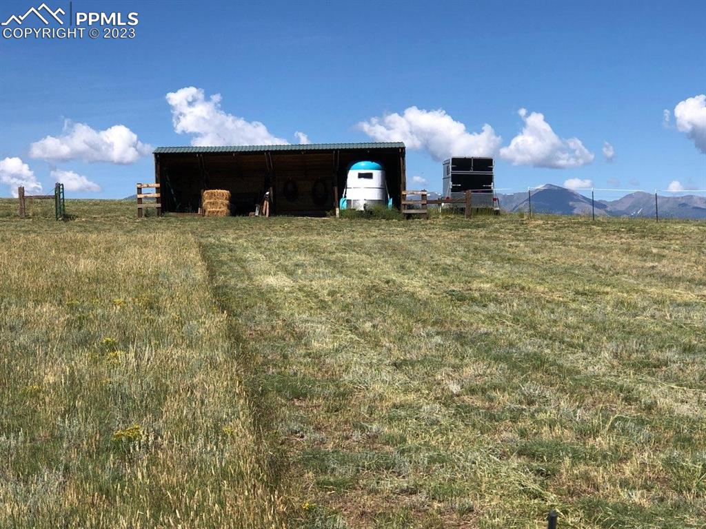 85 Excelsior Road Silver Cliff, CO 81252 - Photo 6 of 27 a view of a fireplace in front of house