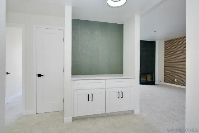 an empty room with mirror