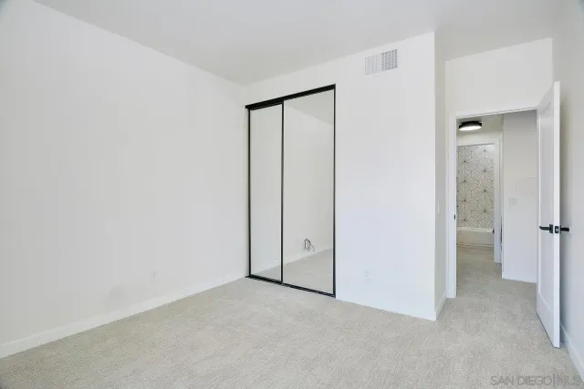 a view of a bathroom with a washer and dryer