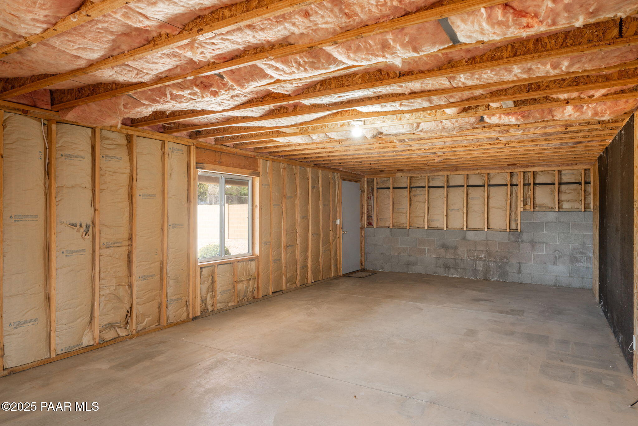 11595 Riata Way Dewey, AZ 86327 - Photo 27 of 44 Basement Storage/Workshop