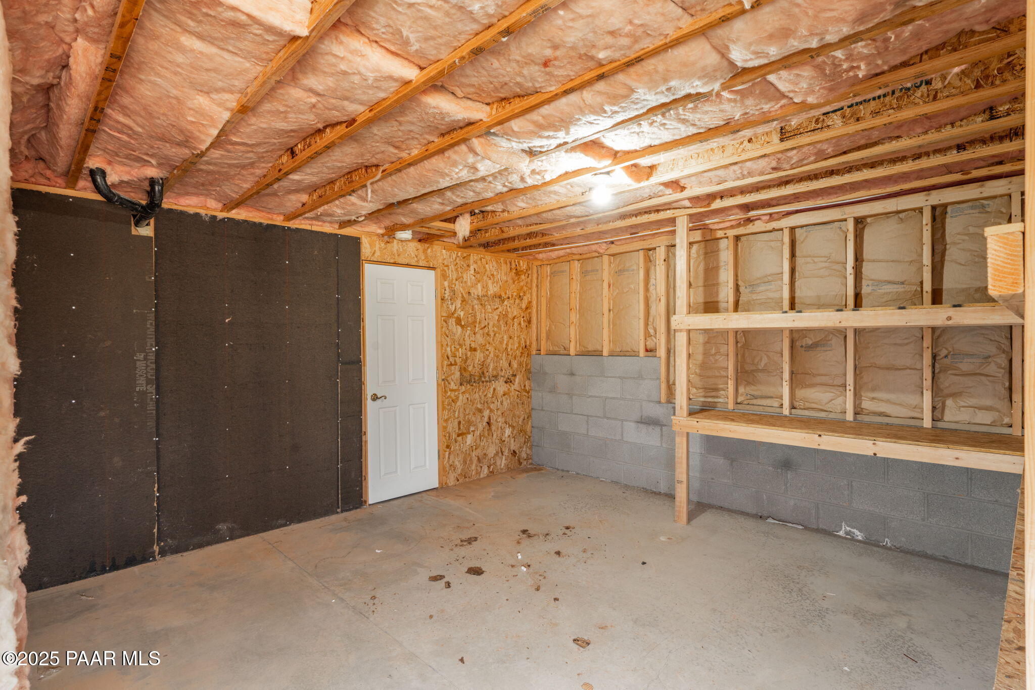 11595 Riata Way Dewey, AZ 86327 - Photo 29 of 44 Basement Storage/Workshop