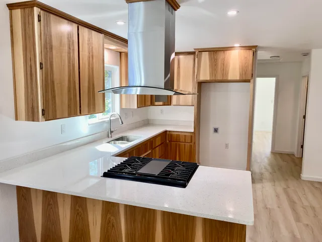 a bathroom with a sink and a large mirror
