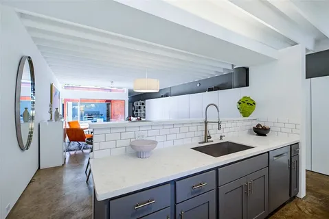 a kitchen with a sink and a cabinets