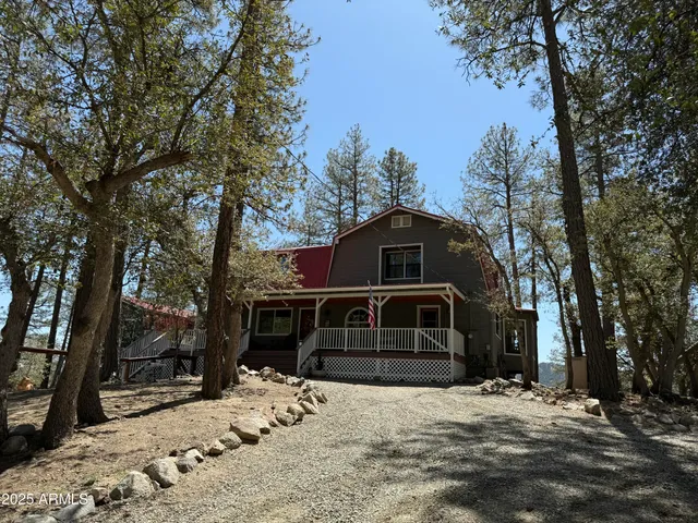 a kitchen with sink stove and refrigerator