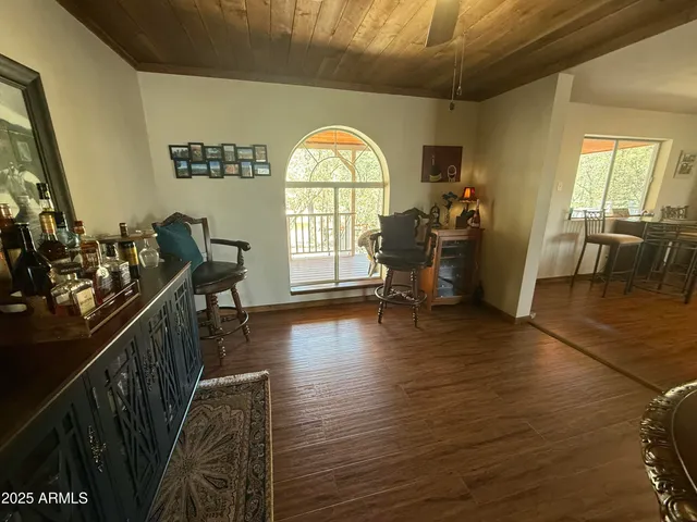 a view of a yard with snow on the road