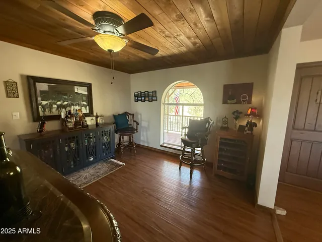 a kitchen with a sink and a stove top oven
