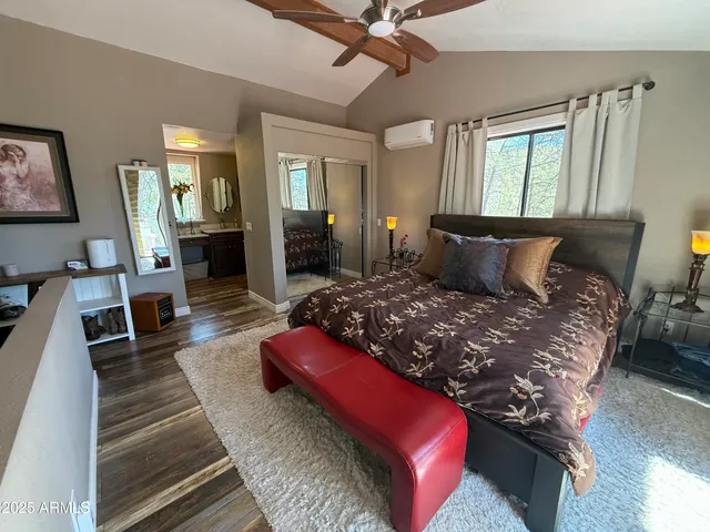 a kitchen with stainless steel appliances granite countertop a refrigerator and a stove