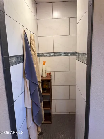 a view of a backyard with sitting area