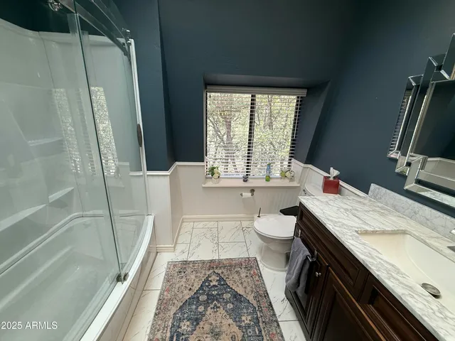 a view of swimming pool from a balcony