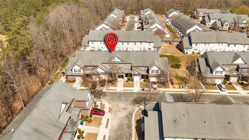 2555 Flat Shoals Road, Unit 1104 College Park, GA 30349 - Photo 2 of 33 an aerial view of houses with outdoor space