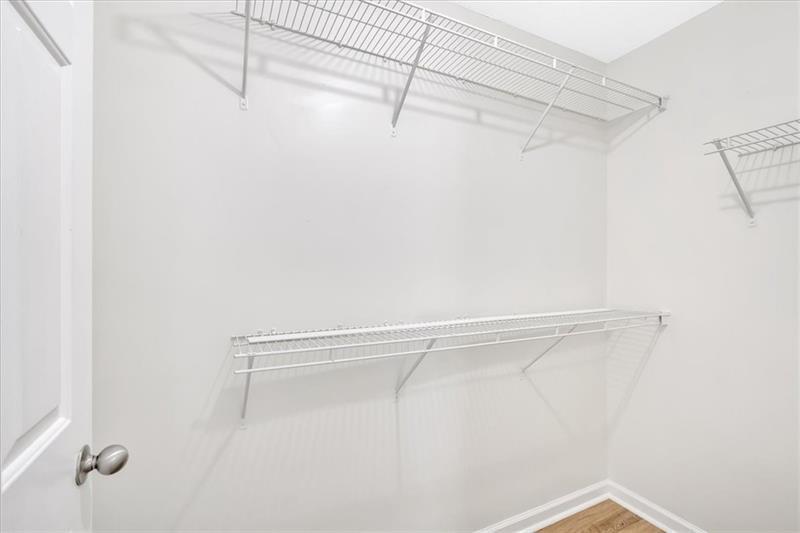 2555 Flat Shoals Road, Unit 1104 College Park, GA 30349 - Photo 30 of 33 a view of a room with racks on the wall