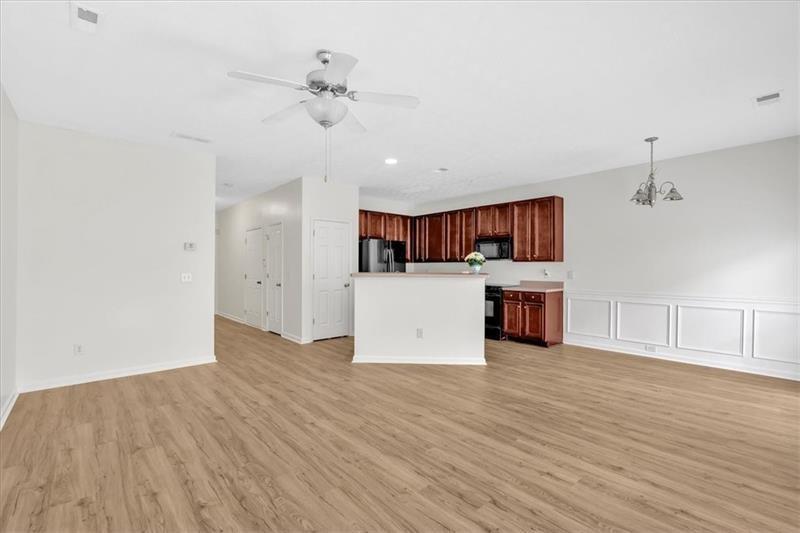 2555 Flat Shoals Road, Unit 1104 College Park, GA 30349 - Photo 4 of 33 a view of a kitchen with wooden floor