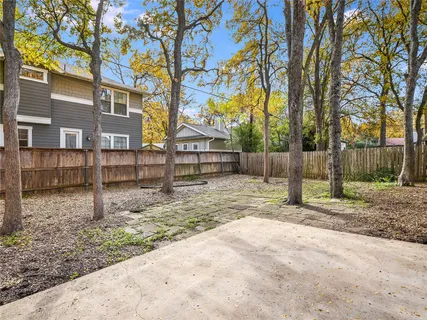 a view of backyard with trees