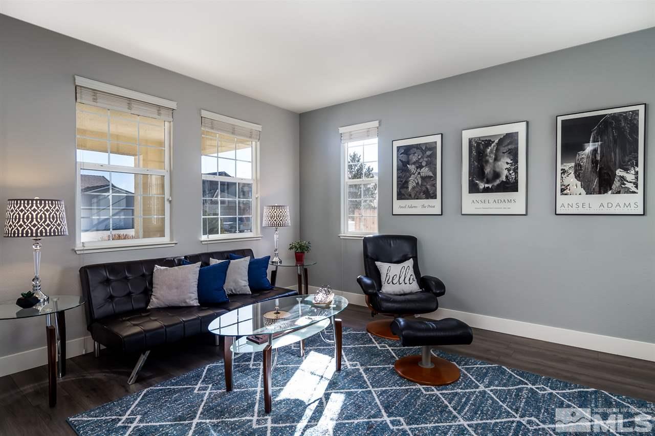 1812 Kodiak Circle Reno, NV 89511 - Photo 5 of 25 a living room with furniture and floor to ceiling windows