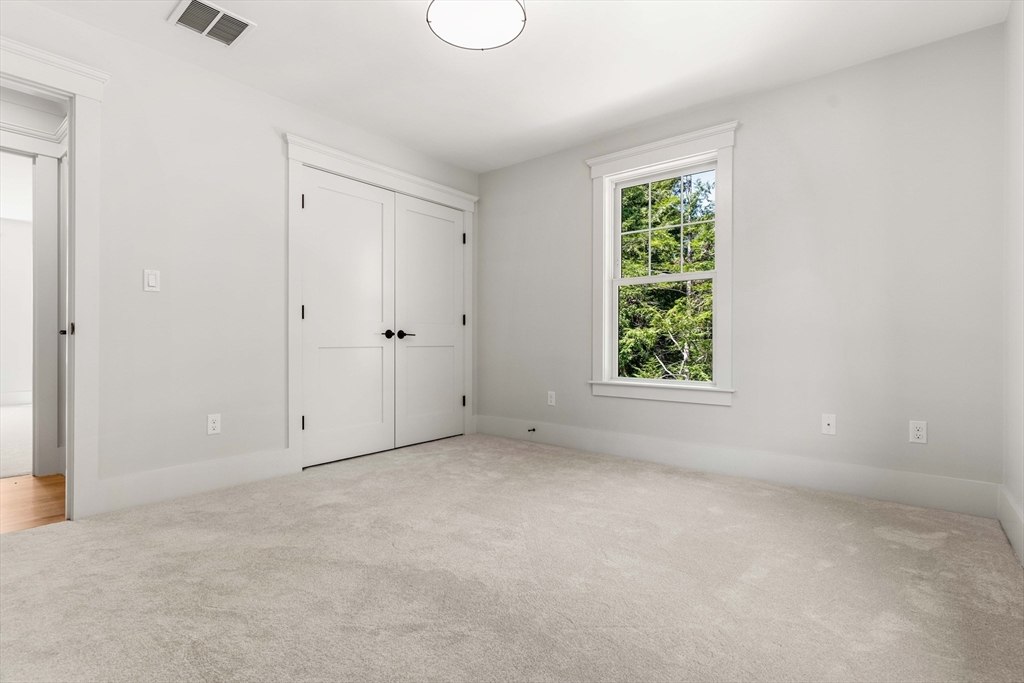 1 Elm Street Middleton, MA 01949 - Photo 29 of 42 a view of an empty room with a window