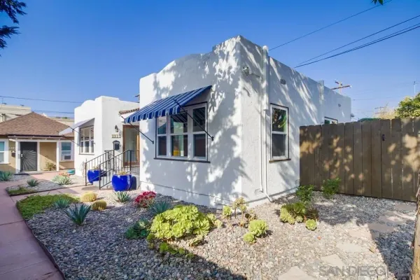 a front view of a house with entertaining space