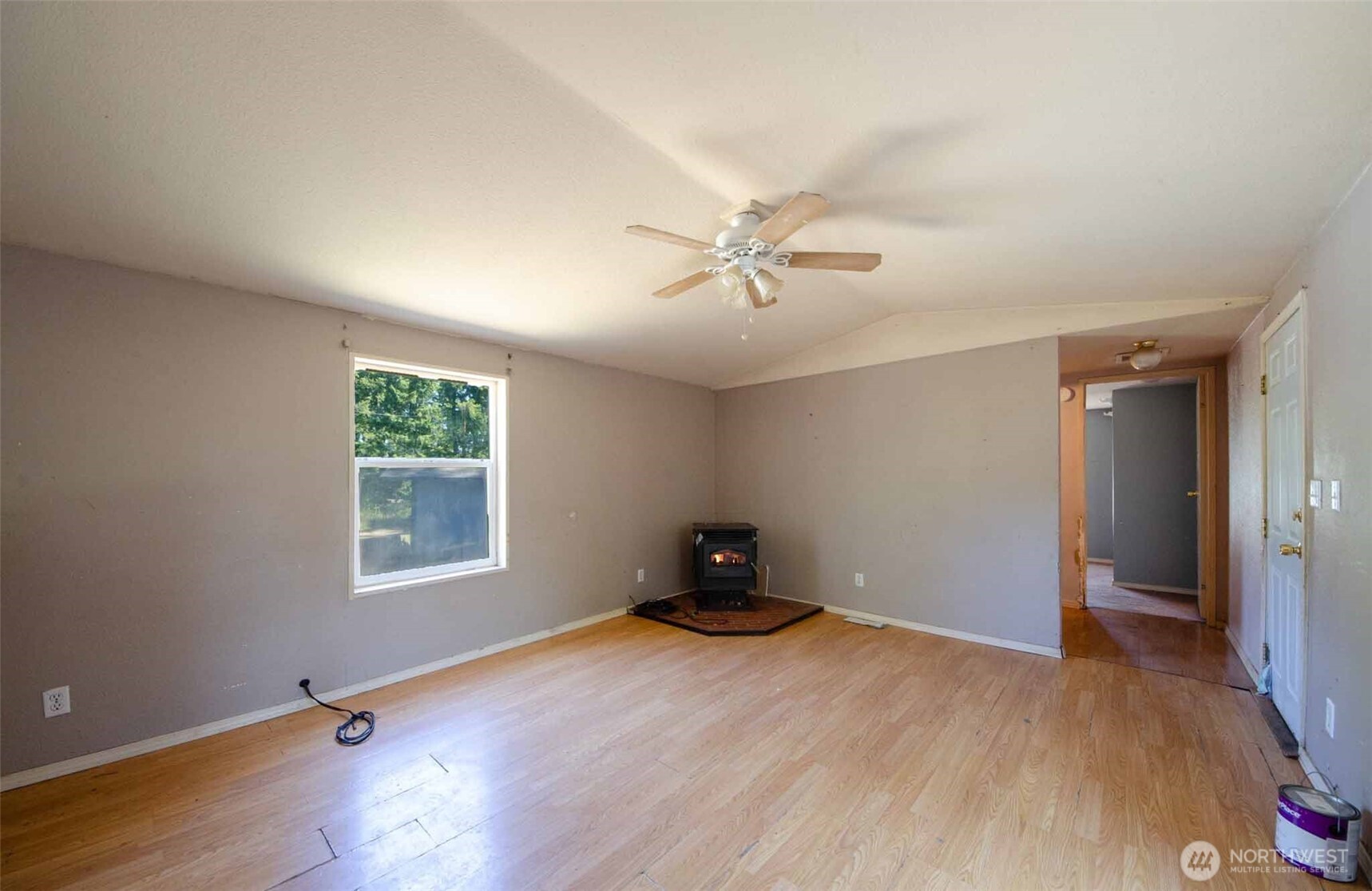1487 Centralia Alpha Road Chehalis, WA 98532 - Photo 19 of 36 an empty room with wooden floor and windows