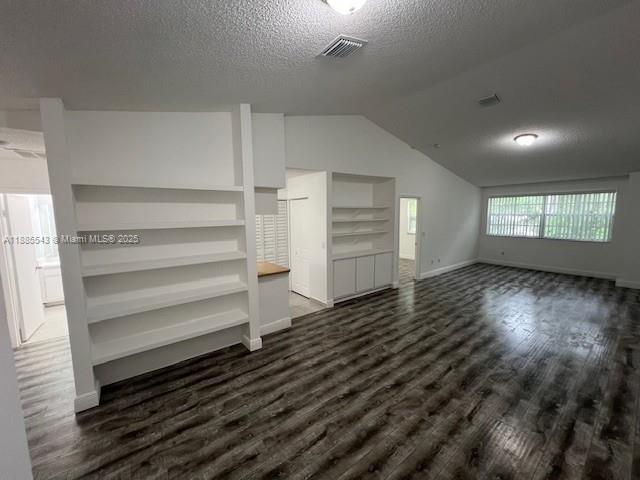 18336 Northwest 68th Avenue, Unit L Hialeah, FL 33015 - Photo 5 of 14 a view of wooden floor and windows in a room