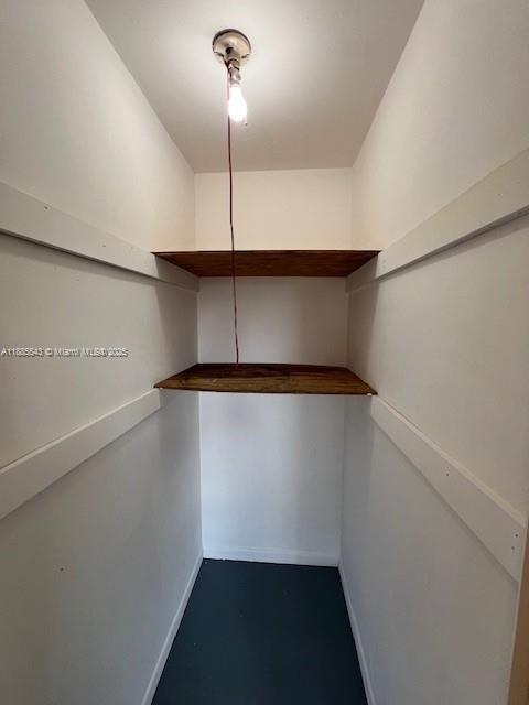 18336 Northwest 68th Avenue, Unit L Hialeah, FL 33015 - Photo 6 of 14 a view of an empty room