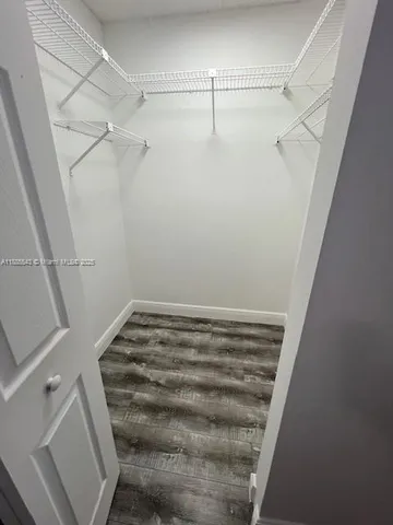 a view of a room with racks on the wall