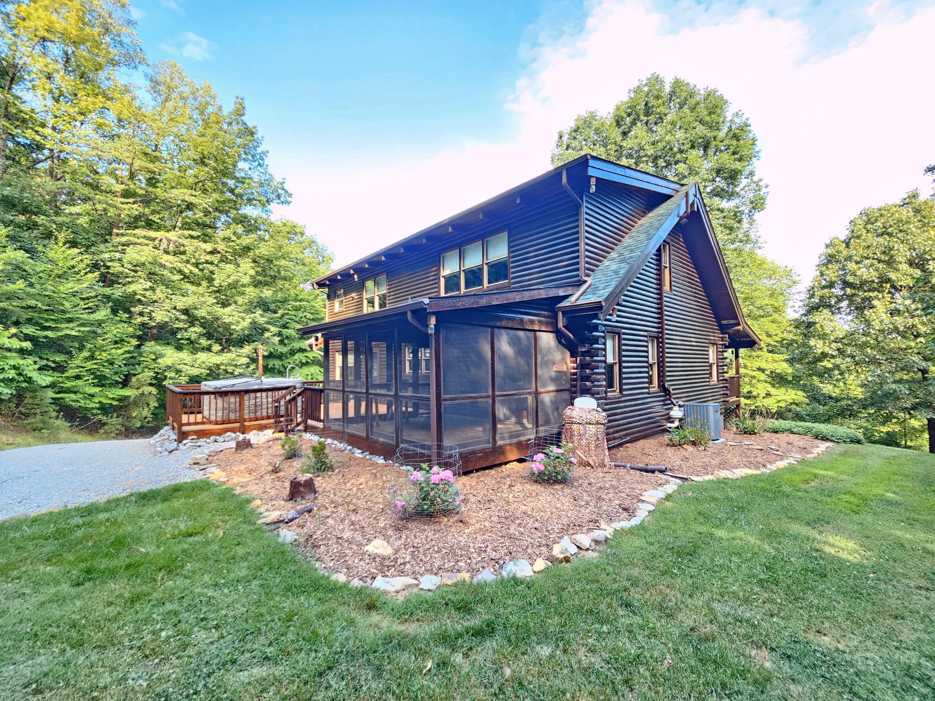 634 Zimmerman Road Blue Ridge, VA 24064 - Photo 1 of 58 a view of a house with a yard porch and sitting area