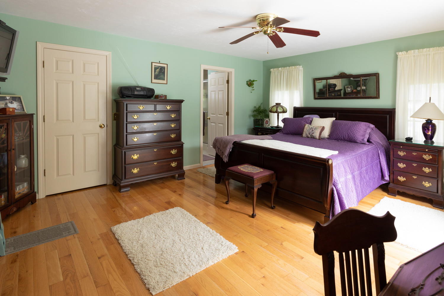 178 Winding Cove Road Marstons Mills, MA 02648 - Photo 12 of 17 a bedroom with a bed and wooden floor