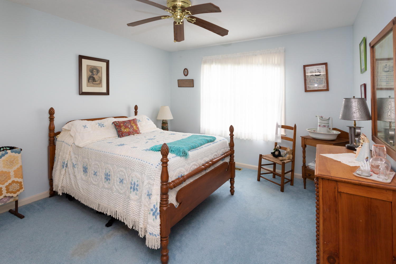 178 Winding Cove Road Marstons Mills, MA 02648 - Photo 14 of 17 a bed sitting in a bedroom next to a window