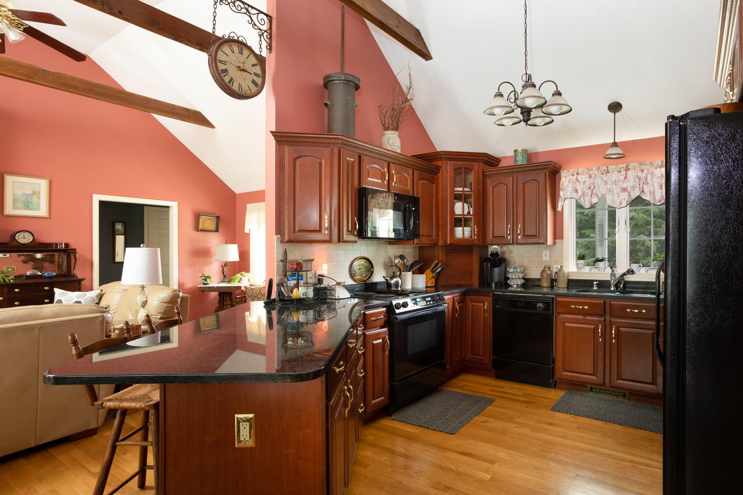 178 Winding Cove Road Marstons Mills, MA 02648 - Photo 7 of 17 a kitchen with stainless steel appliances granite countertop a sink stove and refrigerator