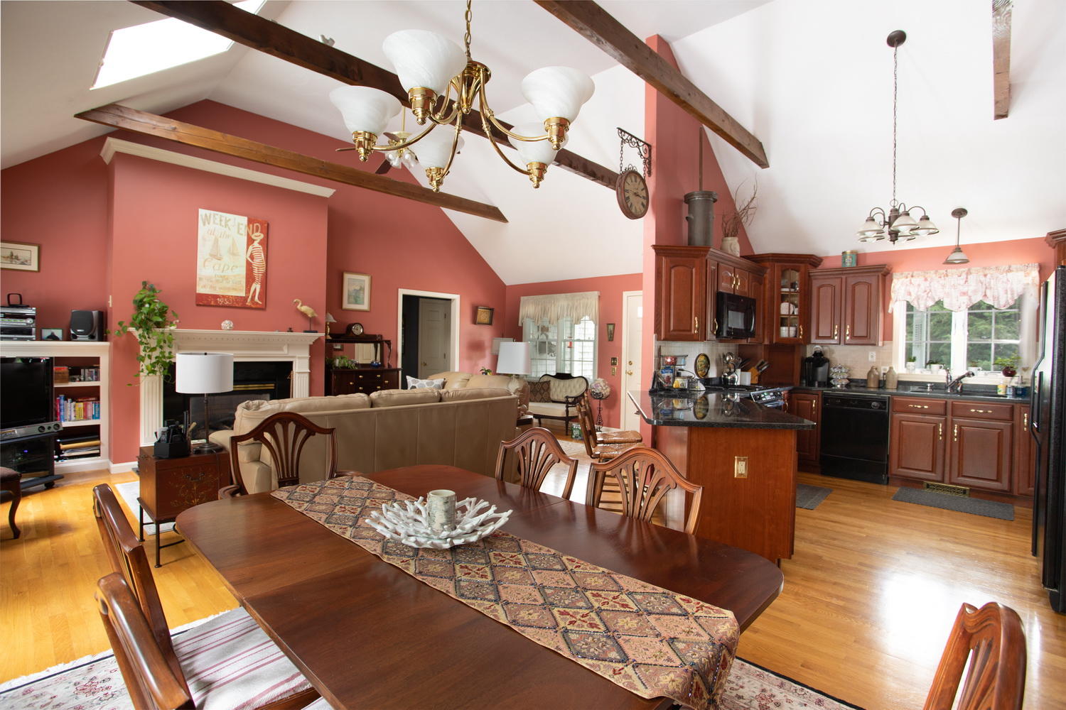 178 Winding Cove Road Marstons Mills, MA 02648 - Photo 9 of 17 a living room with furniture fireplace and a flat screen tv