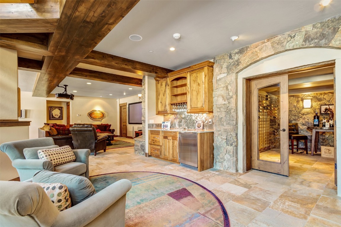 1680 Golden Eagle Road Silverthorne, CO 80498 - Photo 19 of 40 a very nice looking living room with a large window