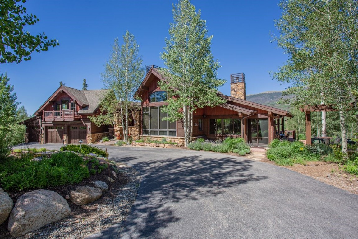 1680 Golden Eagle Road Silverthorne, CO 80498 - Photo 25 of 40 a front view of a house with a garden