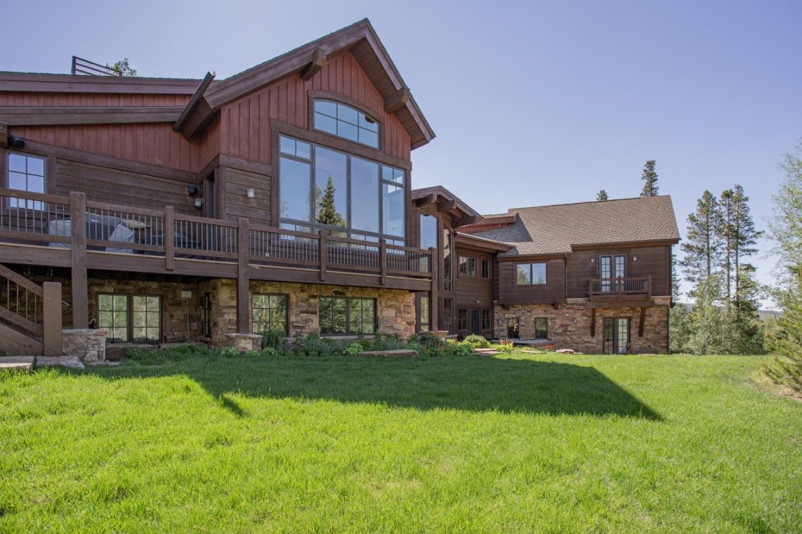 1680 Golden Eagle Road Silverthorne, CO 80498 - Photo 32 of 40 a front view of a house with a yard