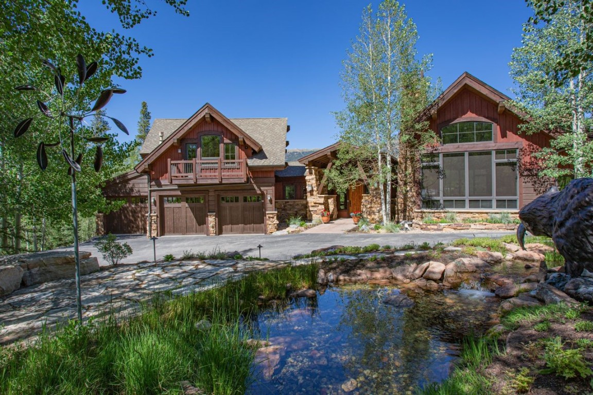 1680 Golden Eagle Road Silverthorne, CO 80498 - Photo 34 of 40 a front view of a house with a yard