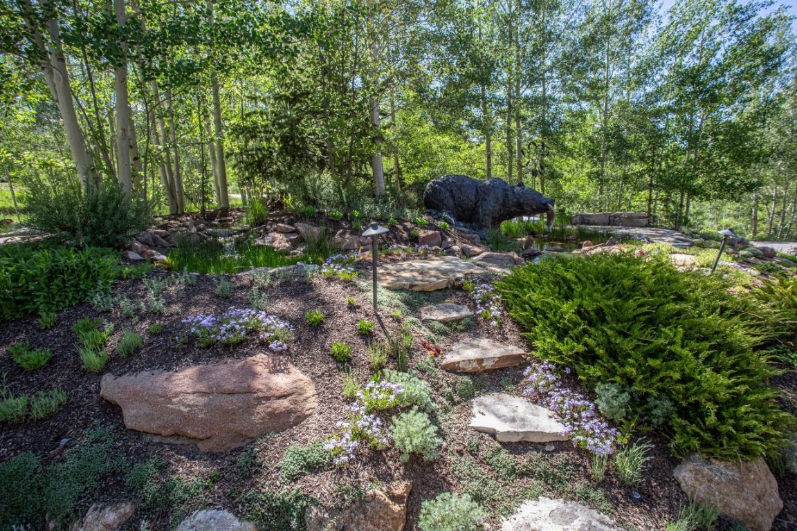 1680 Golden Eagle Road Silverthorne, CO 80498 - Photo 36 of 40 a view of a garden with a tree