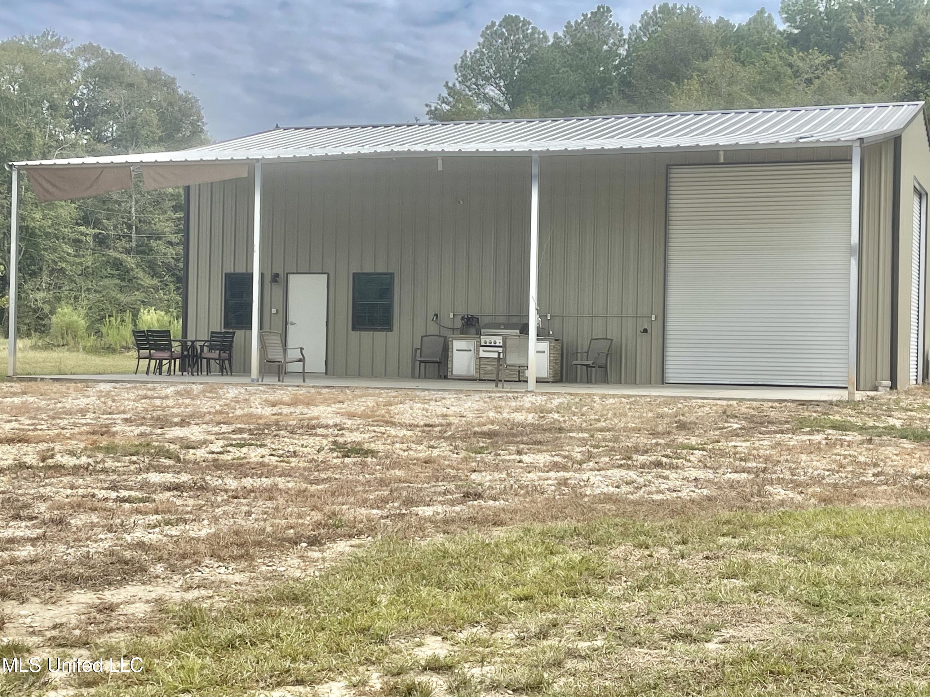 61 J M Tynes Road Poplarville, MS 39470 - Photo 2 of 26 FDDC3F75-F989-43BB-B47C-A7A09742FD96_1_2