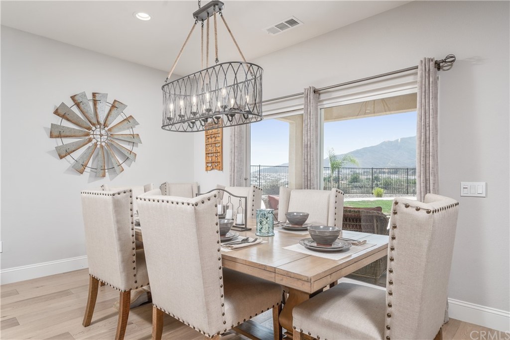 17841 Grapevine Lane San Bernardino, CA 92407 - Photo 19 of 53 a view of a dining room with furniture window and outside view