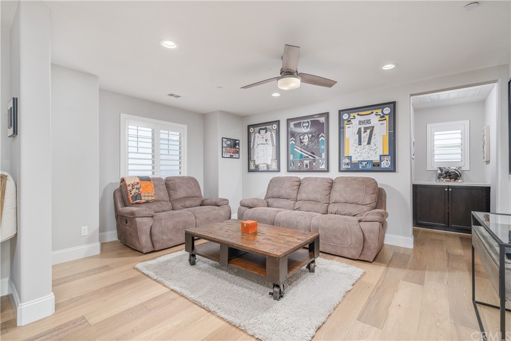 17841 Grapevine Lane San Bernardino, CA 92407 - Photo 27 of 53 a living room with furniture and a chandelier