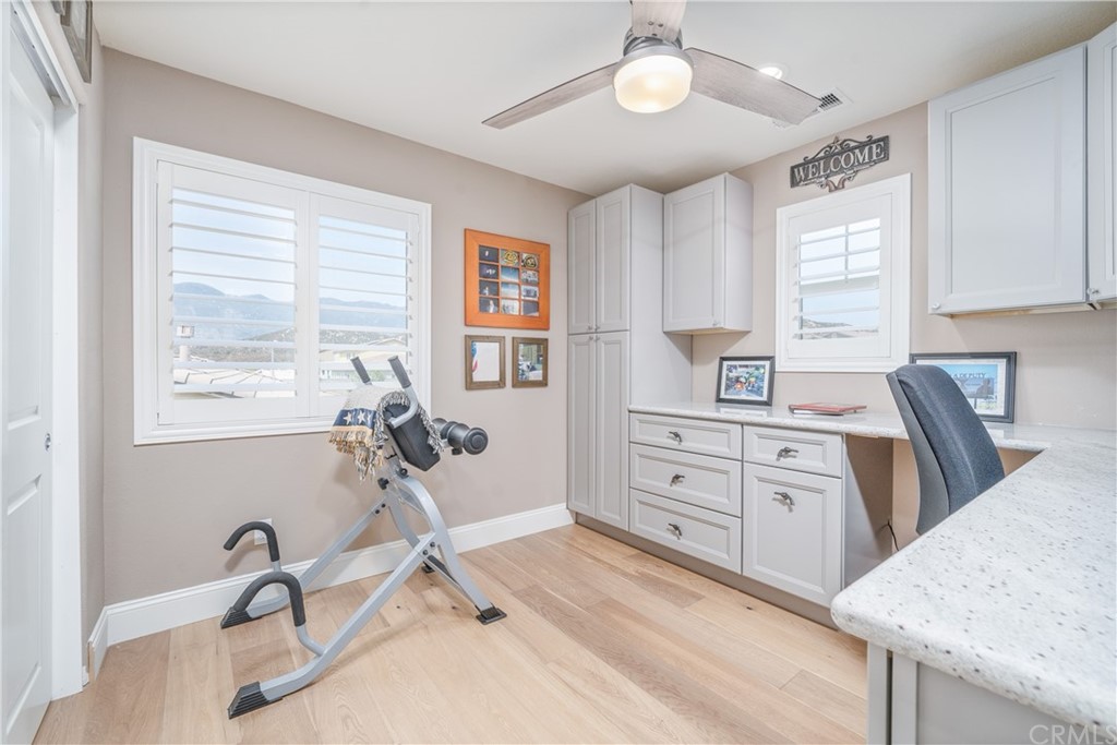 17841 Grapevine Lane San Bernardino, CA 92407 - Photo 29 of 53 a kitchen with granite countertop a sink window and cabinets