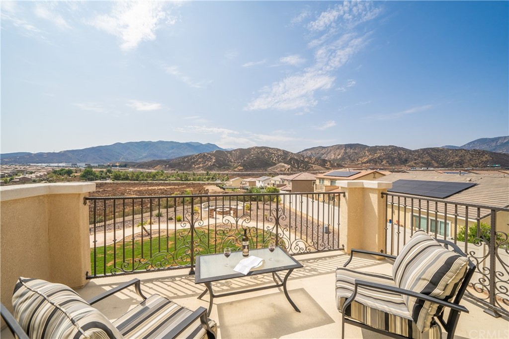 17841 Grapevine Lane San Bernardino, CA 92407 - Photo 34 of 53 a view of a balcony with lake view and mountain view