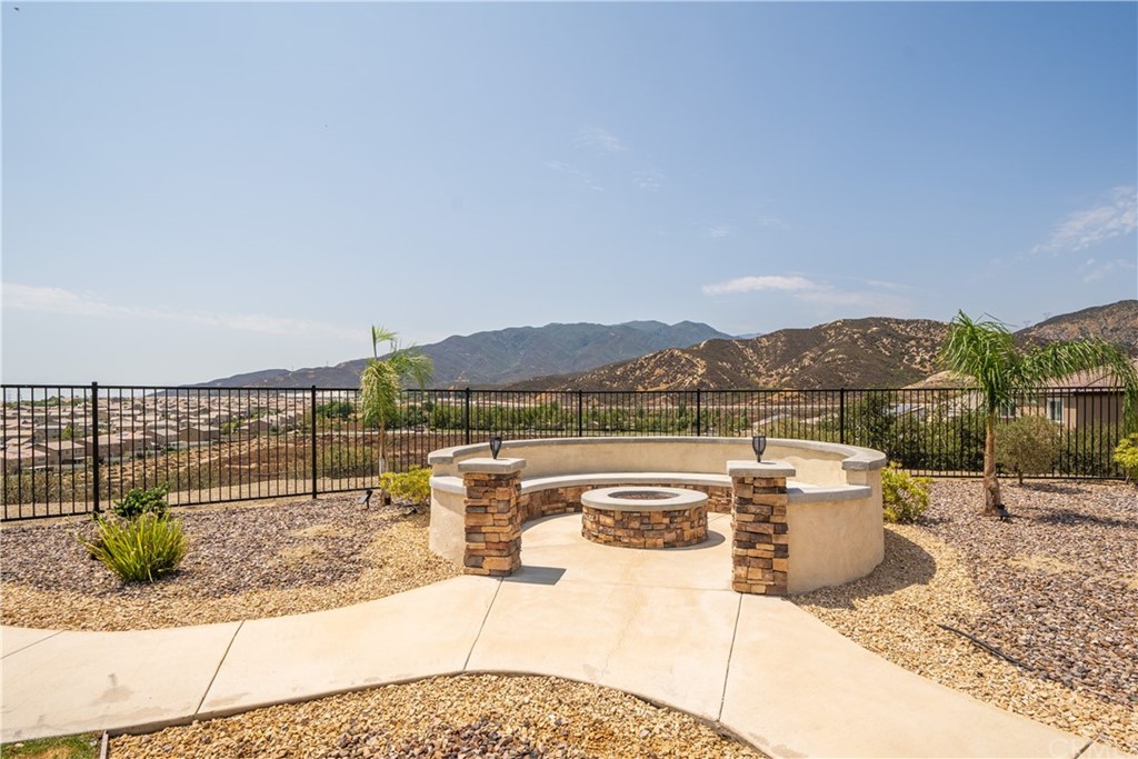 17841 Grapevine Lane San Bernardino, CA 92407 - Photo 42 of 53 a view of a terrace with a lounge chair