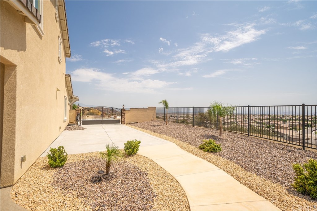 17841 Grapevine Lane San Bernardino, CA 92407 - Photo 44 of 53 a view of a swimming pool with a lounge chair