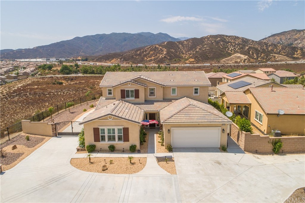 17841 Grapevine Lane San Bernardino, CA 92407 - Photo 45 of 53 a front view of a house with a yard