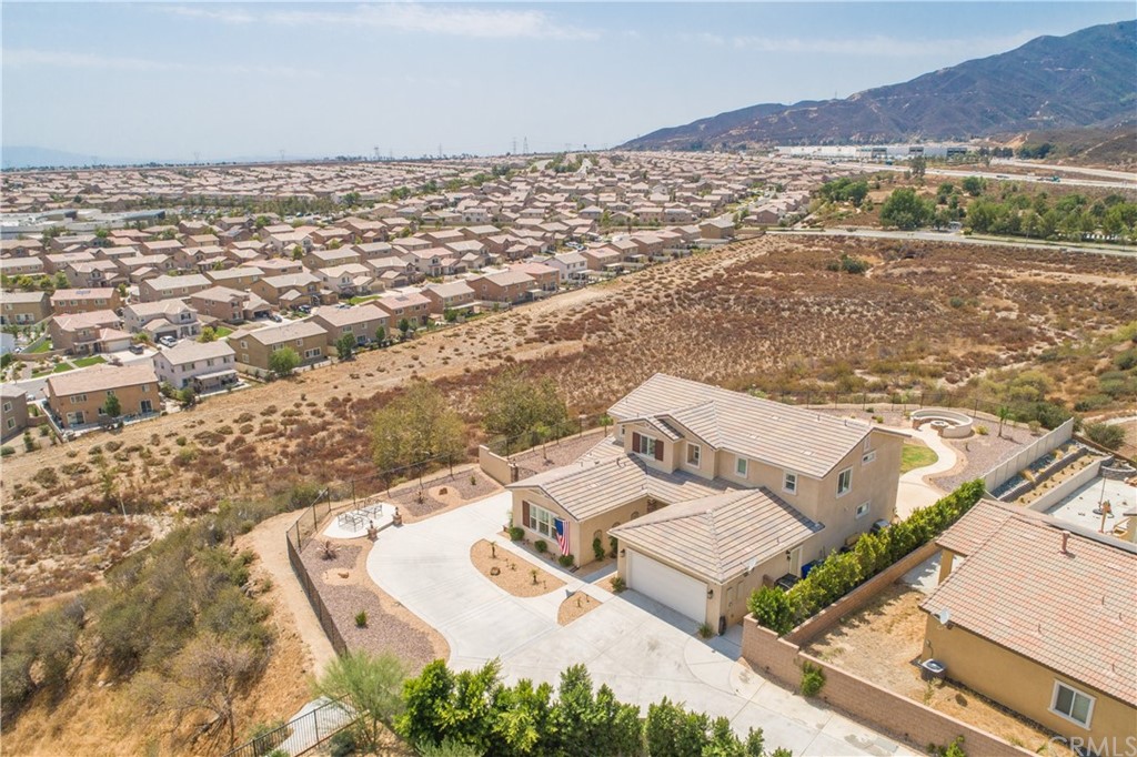 17841 Grapevine Lane San Bernardino, CA 92407 - Photo 50 of 53 an aerial view of a house with a mountain