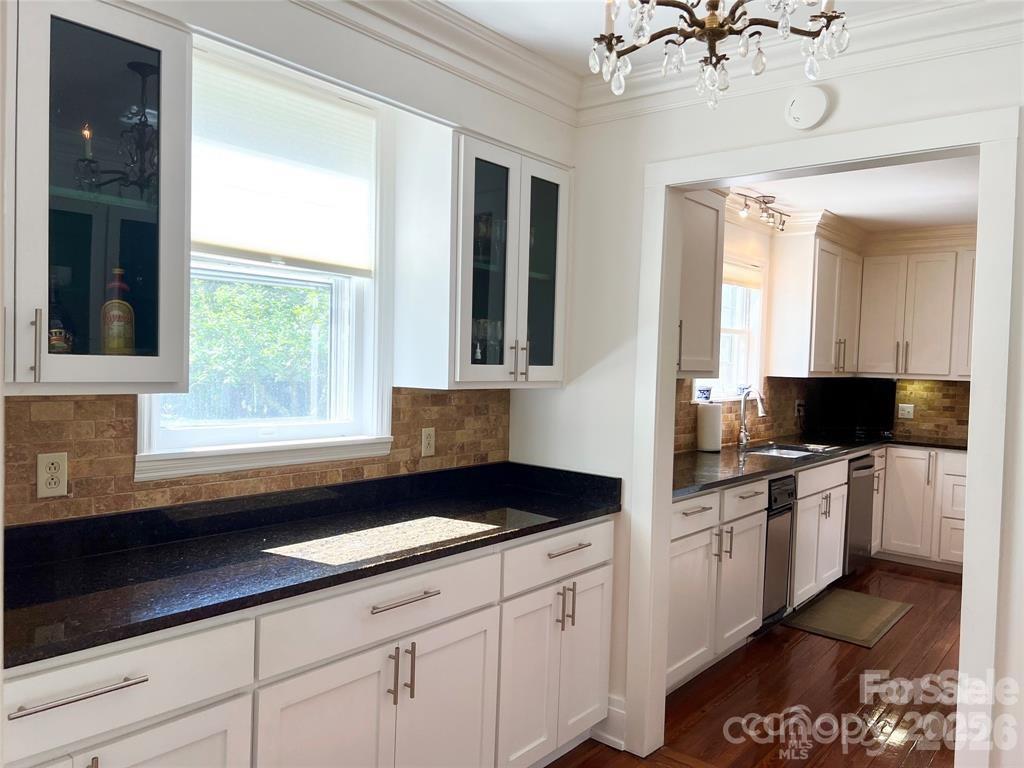 530 East Rutledge Avenue Gaffney, SC 29340 - Photo 15 of 47 a kitchen with a sink cabinets and window