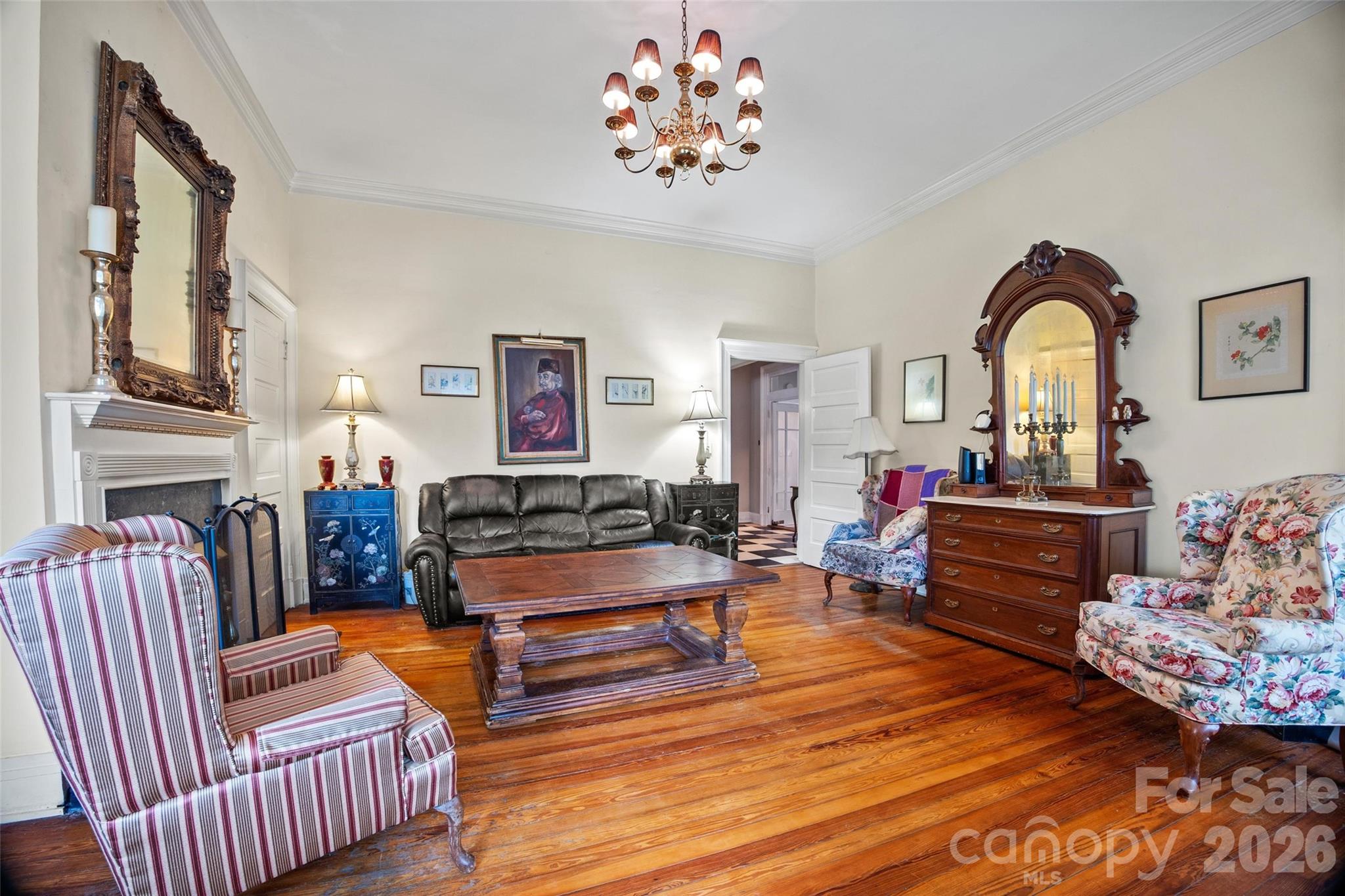 530 East Rutledge Avenue Gaffney, SC 29340 - Photo 22 of 47 a living room with furniture flowerpot and a chandelier