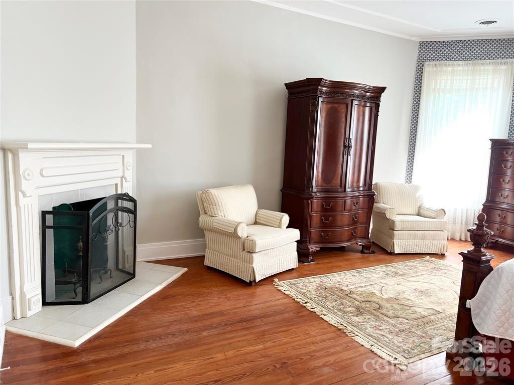 530 East Rutledge Avenue Gaffney, SC 29340 - Photo 34 of 47 a living room with furniture and a fireplace