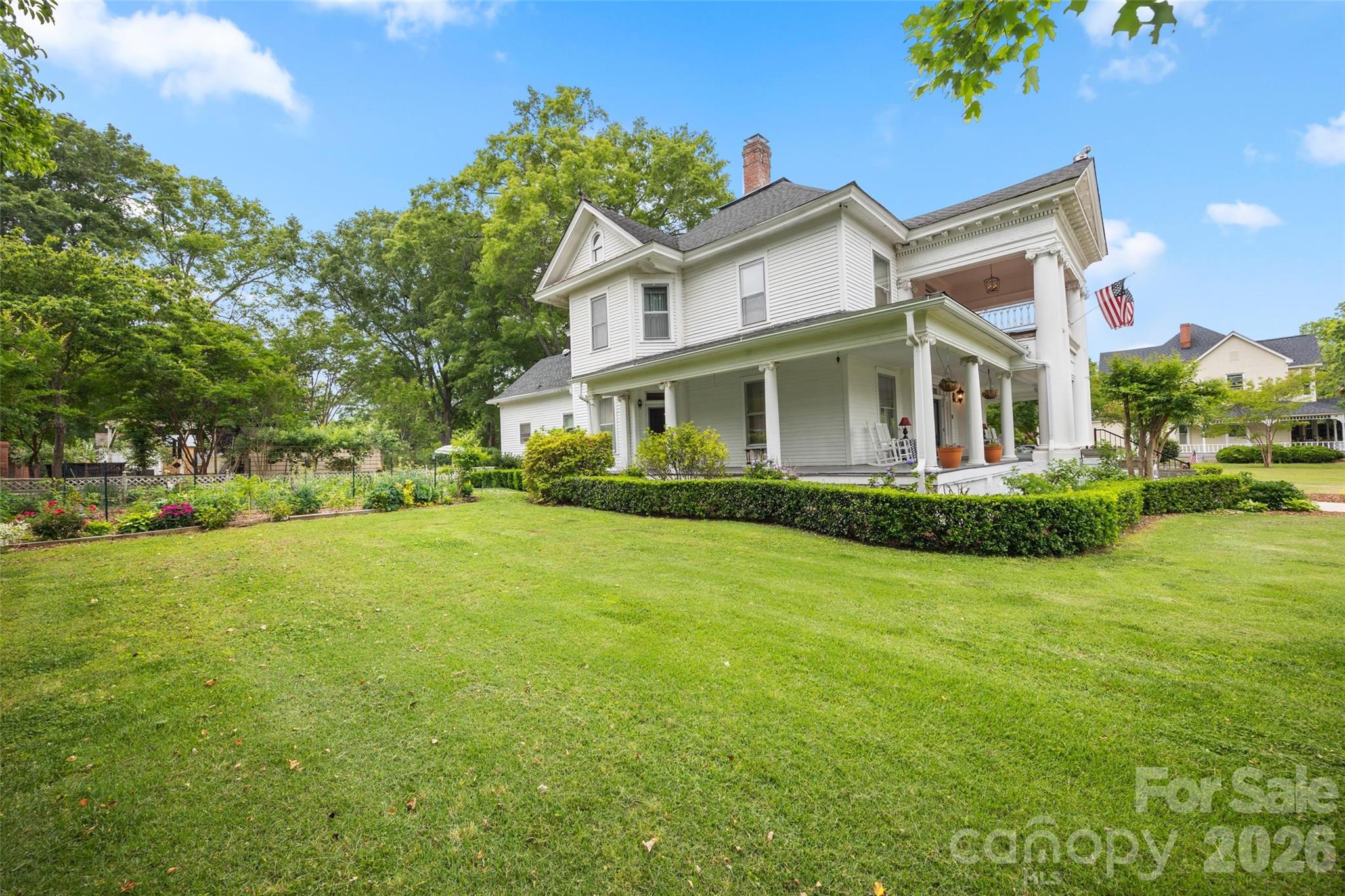 530 East Rutledge Avenue Gaffney, SC 29340 - Photo 44 of 47 a front view of a house with a yard