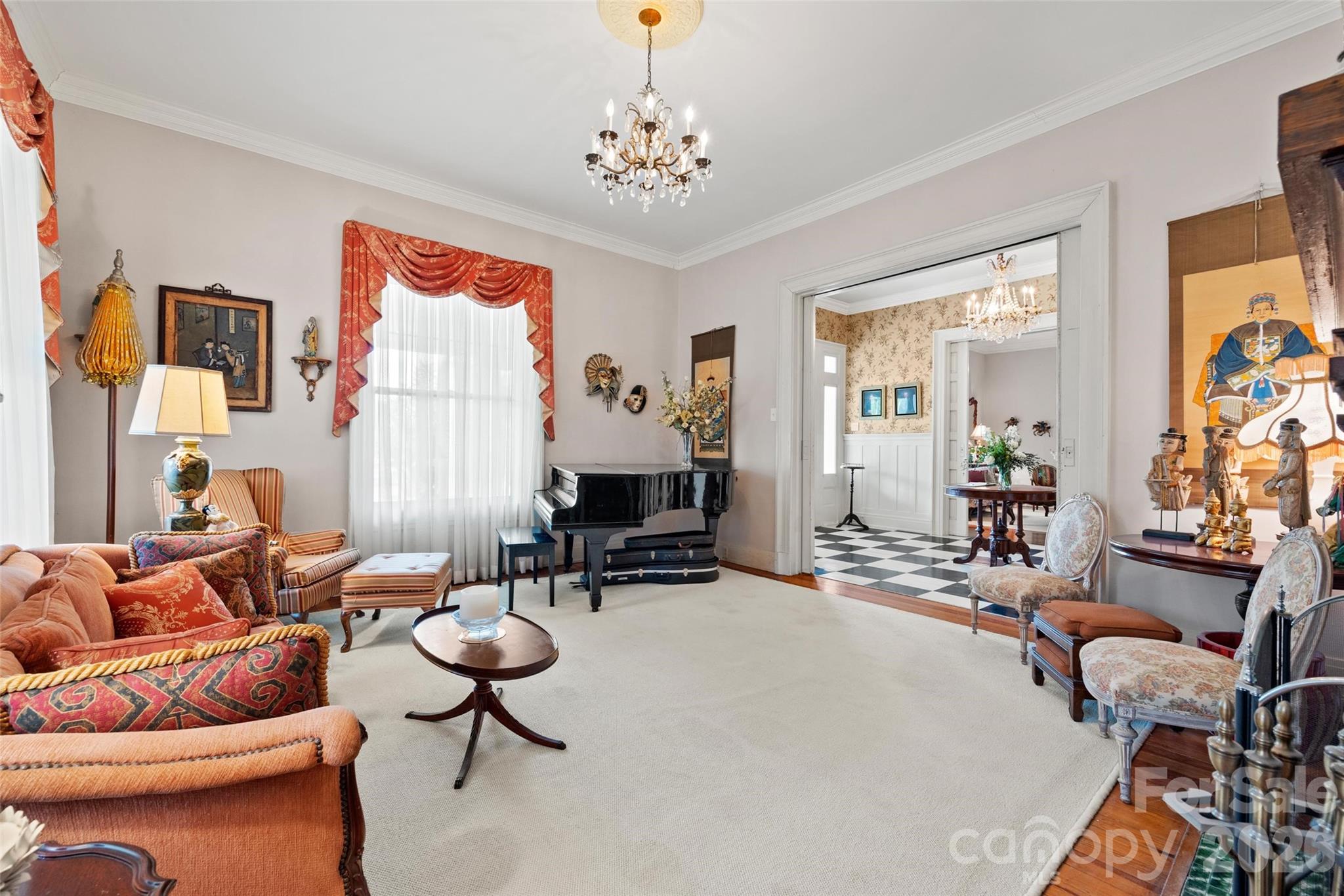 530 East Rutledge Avenue Gaffney, SC 29340 - Photo 9 of 47 a living room with furniture a couch and a chandelier