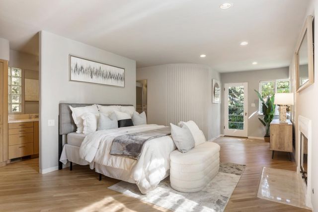 a bed room with a bed and a couch