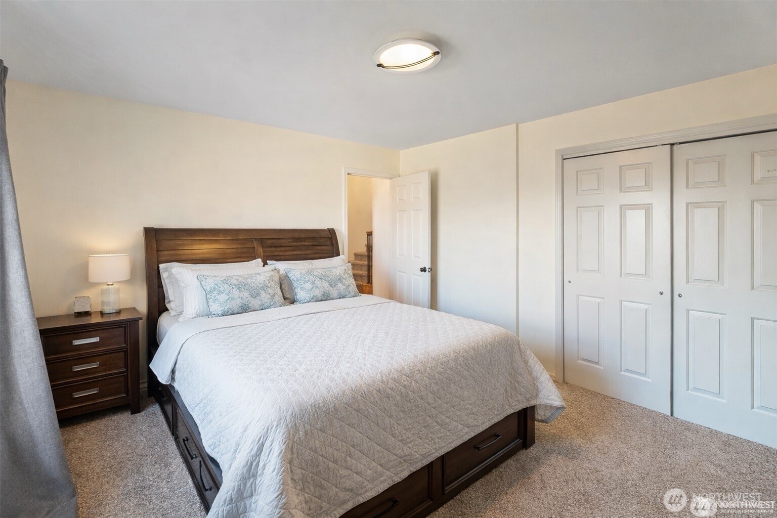 1918 Broadview Wenatchee, WA 98801 - Photo 26 of 38 a bedroom with a bed and a night stand